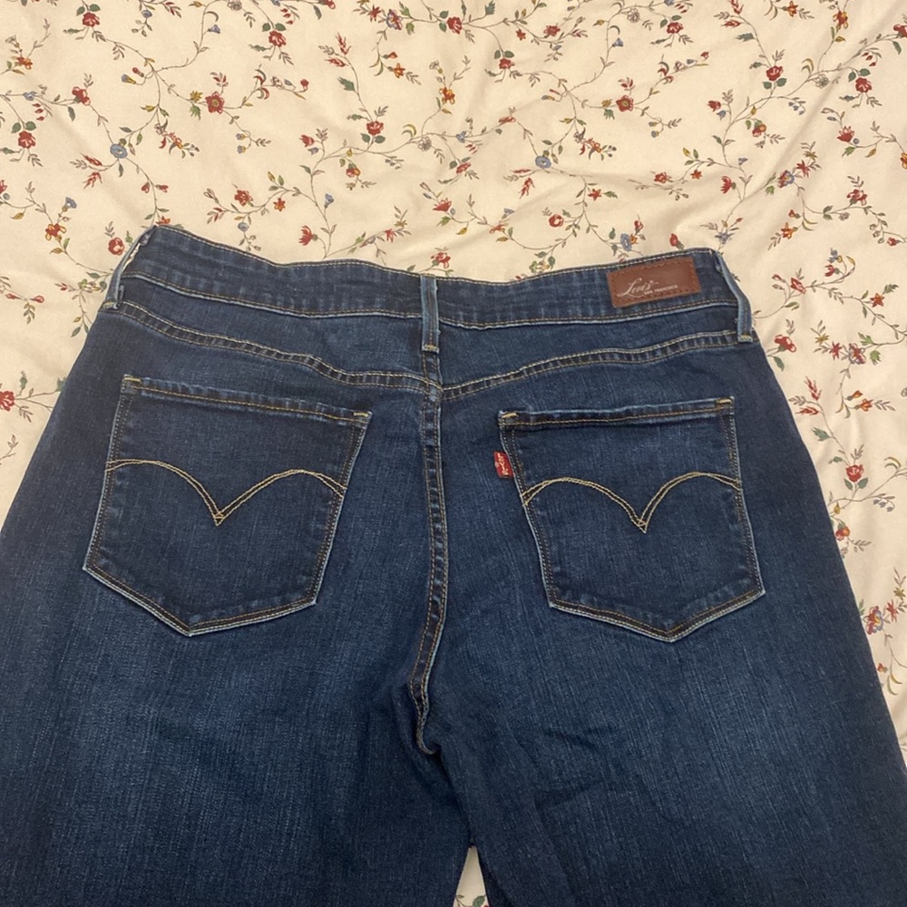 Levi’s high rise demi curve jeans